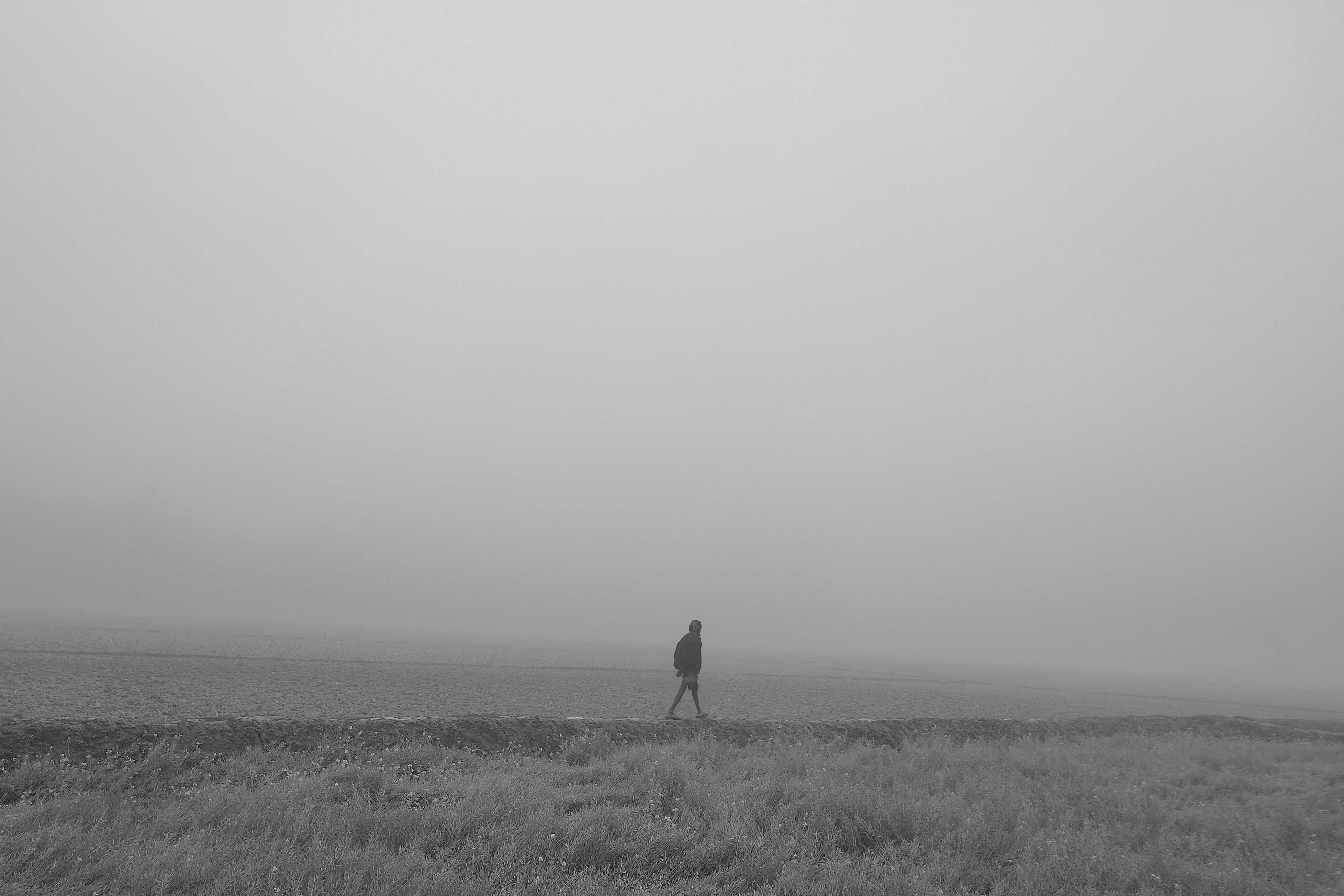 Monochrome life of a farmer in winter morning